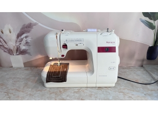 máy may gia đình Janome Monaze E2000