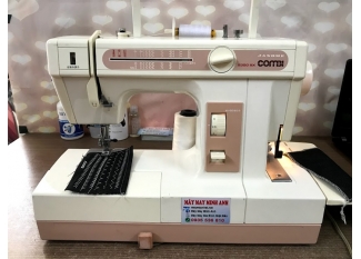 máy may gia đình và vắt sổ Janome Combi
